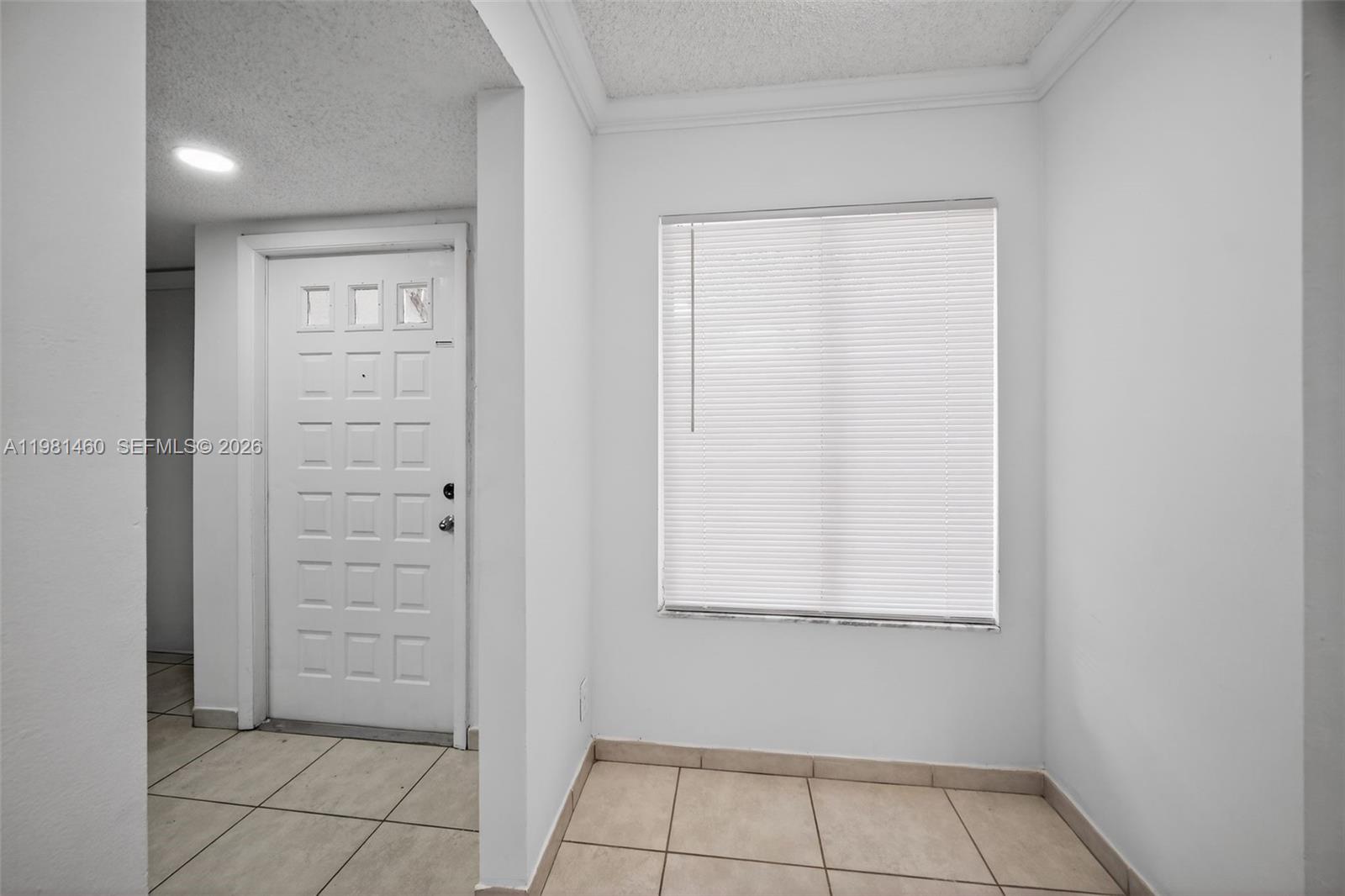 9436 Southwest 140th Court, Unit 9436 Miami, FL 33186 - Photo 8 of 40 an empty room with closet