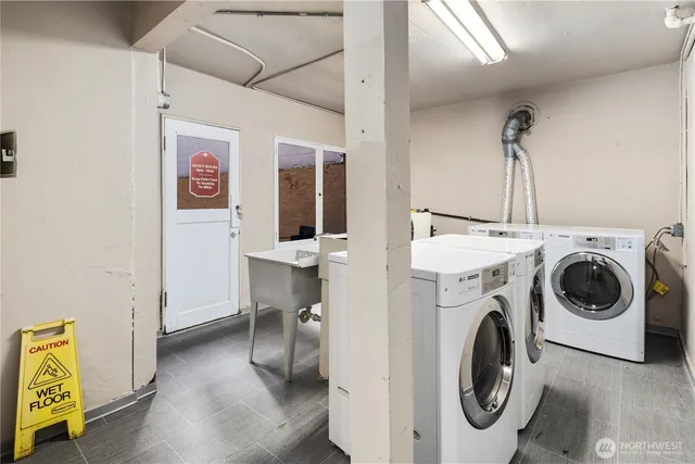 a utility room with dryer and washer