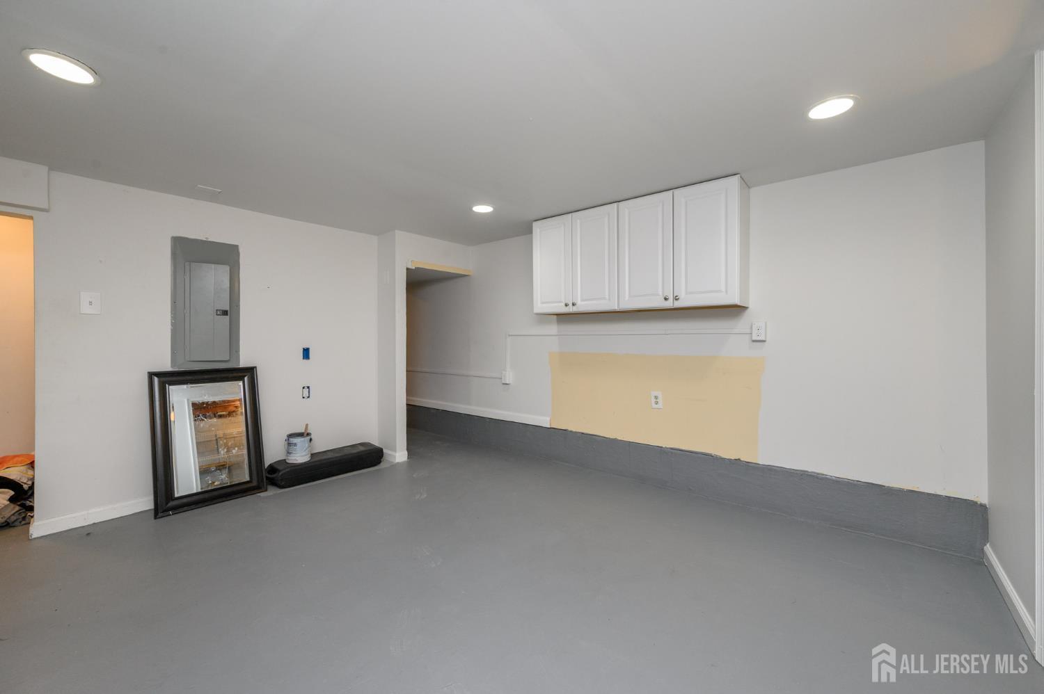 384 Cook Road Jackson, NJ 08527 - Photo 24 of 31 a view of a kitchen with a sink and a refrigerator