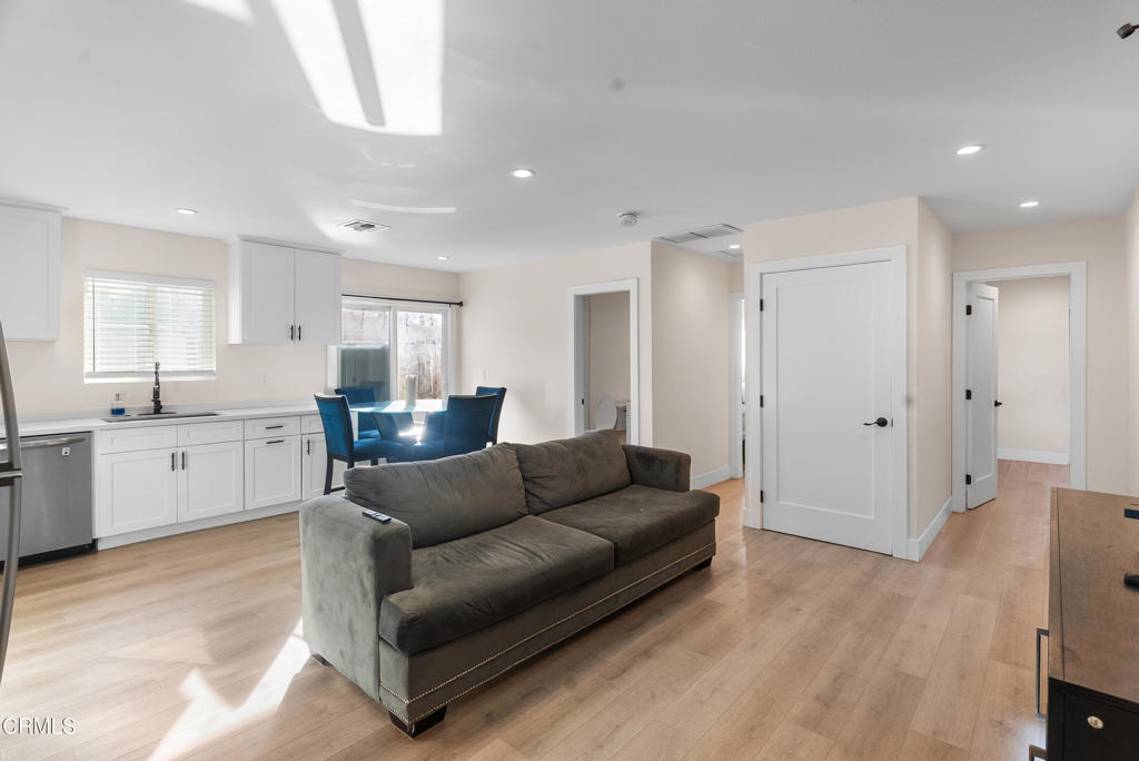 2549 Young Avenue, Unit B Thousand Oaks, CA 91360 - Photo 3 of 14 a living room with furniture and kitchen view