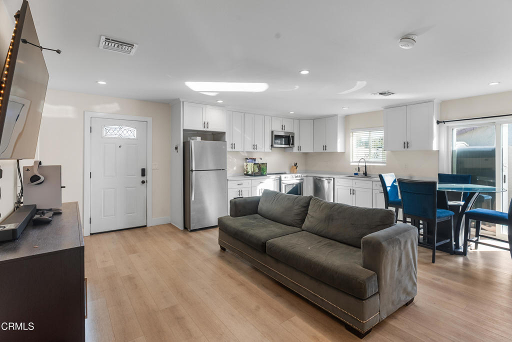 2549 Young Avenue, Unit B Thousand Oaks, CA 91360 - Photo 4 of 14 a living room kitchen with furniture and a view of kitchen