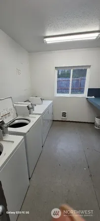 a view of lot of furniture and window