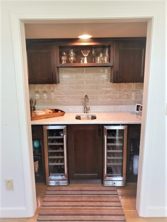 10 Windsor Lane Marshfield, MA 02050 - Photo 11 of 31 a bathroom with a sink and a mirror
