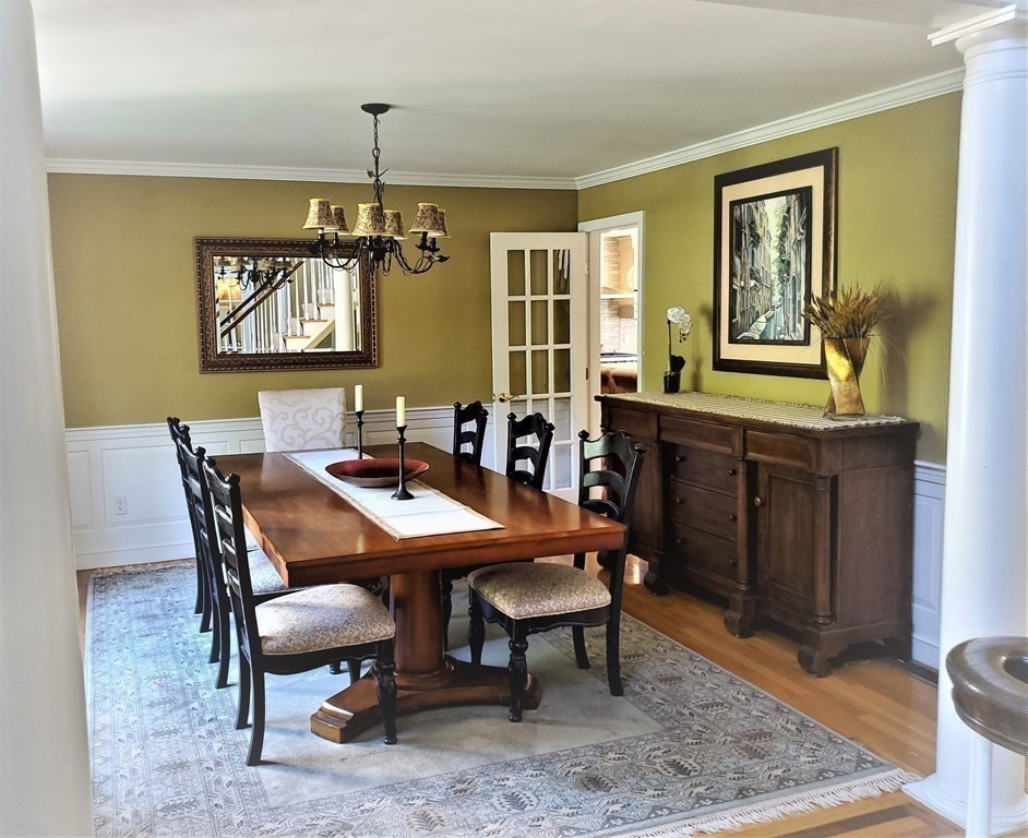 10 Windsor Lane Marshfield, MA 02050 - Photo 12 of 31 a view of a dining room with furniture window and wooden floor