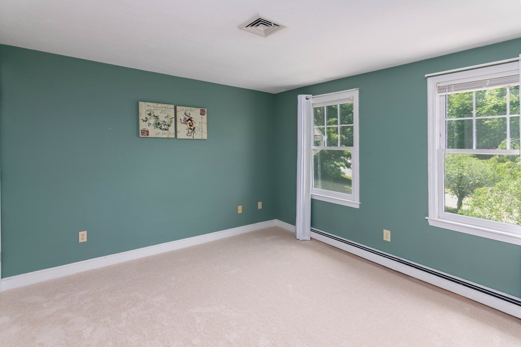 10 Windsor Lane Marshfield, MA 02050 - Photo 18 of 31 a view of an empty room with a window
