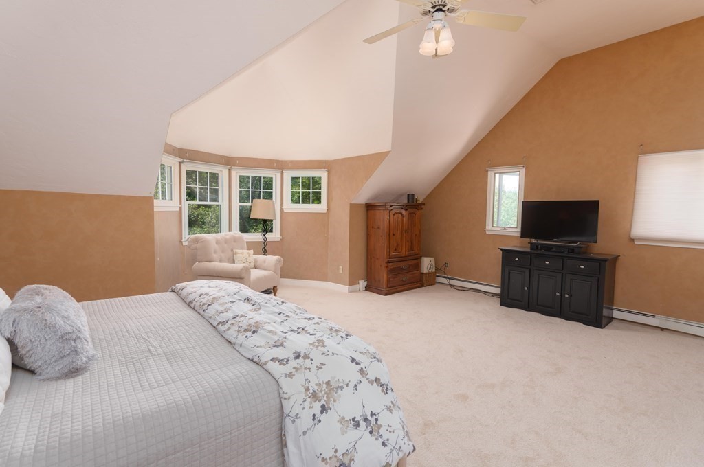 10 Windsor Lane Marshfield, MA 02050 - Photo 22 of 31 a bed room with a bed television and a window