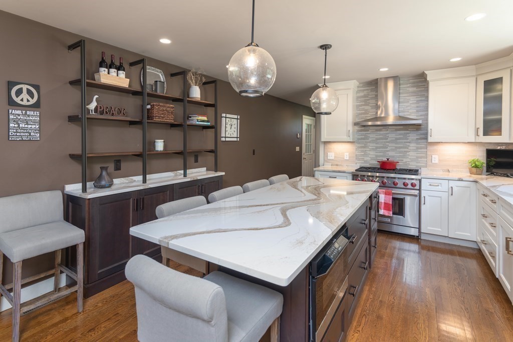 10 Windsor Lane Marshfield, MA 02050 - Photo 5 of 31 a kitchen that has a table and chairs in it