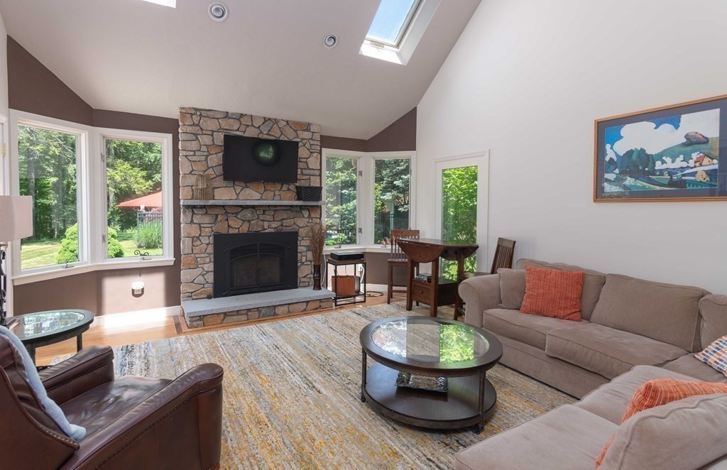 10 Windsor Lane Marshfield, MA 02050 - Photo 9 of 31 a living room with furniture a window and a fireplace