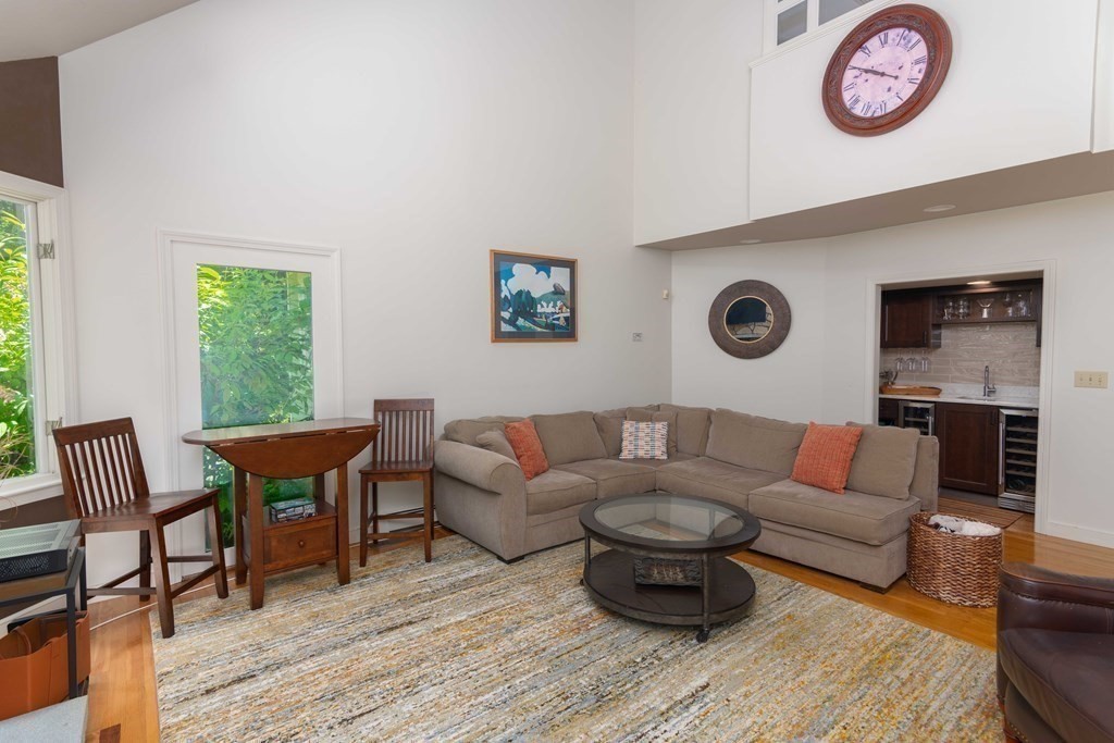 10 Windsor Lane Marshfield, MA 02050 - Photo 10 of 31 a living room with furniture and a wooden floor