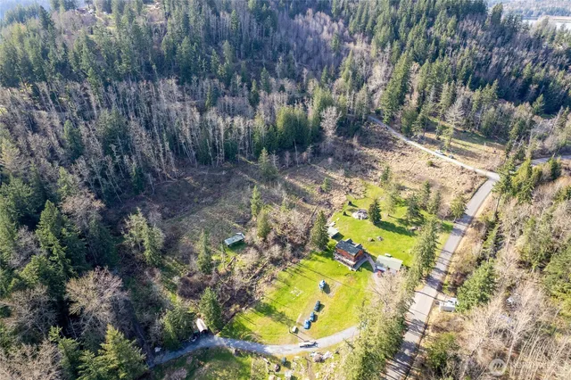 a view of a house with a street