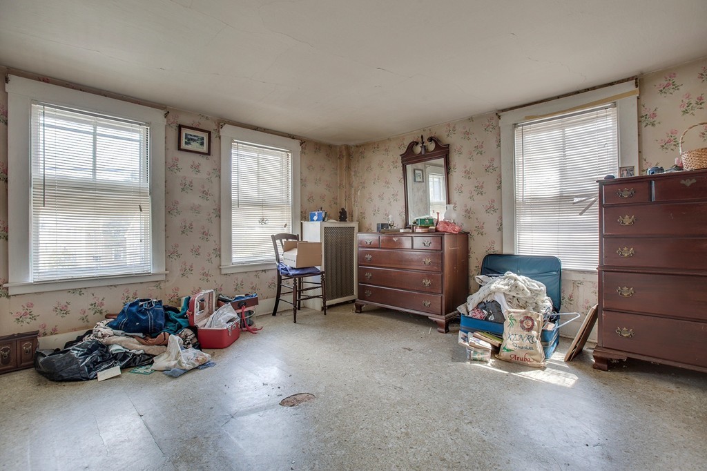 218 West Street Reading, MA 01867 - Photo 17 of 22 a room with furniture and windows