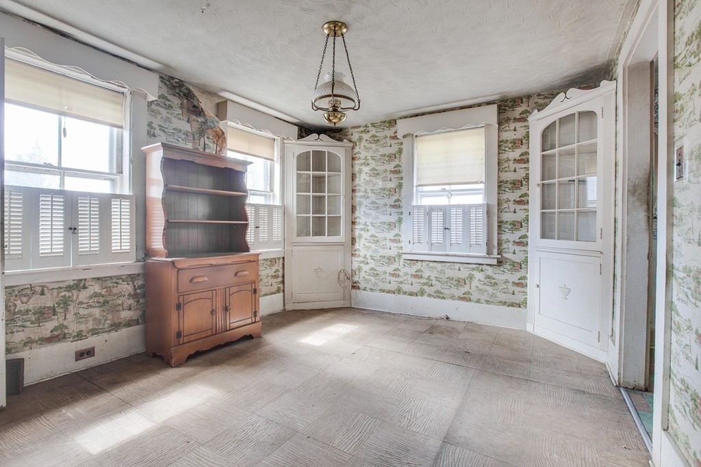 218 West Street Reading, MA 01867 - Photo 6 of 22 a view of an empty room with a window