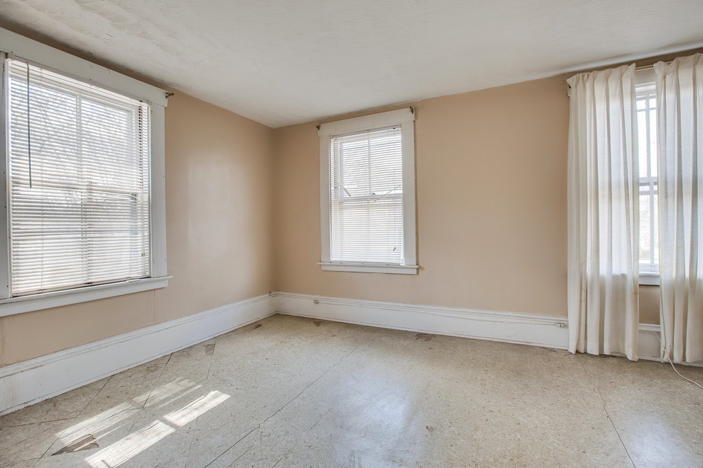 218 West Street Reading, MA 01867 - Photo 9 of 22 an empty room with windows
