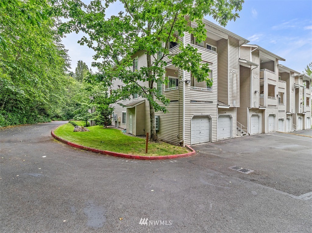 a view of a house with a sink and yard