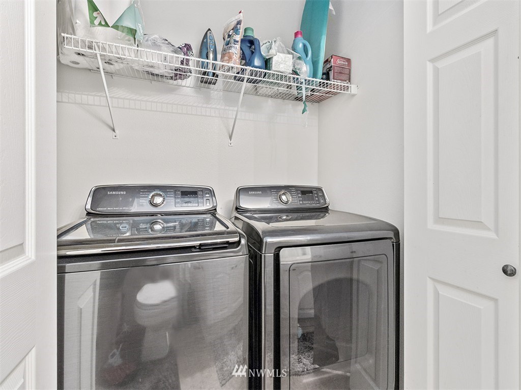 801 Rainier Avenue North, Unit G234 Renton, WA 98057 - Photo 14 of 19 a view of storage and utility room with racks on the wall
