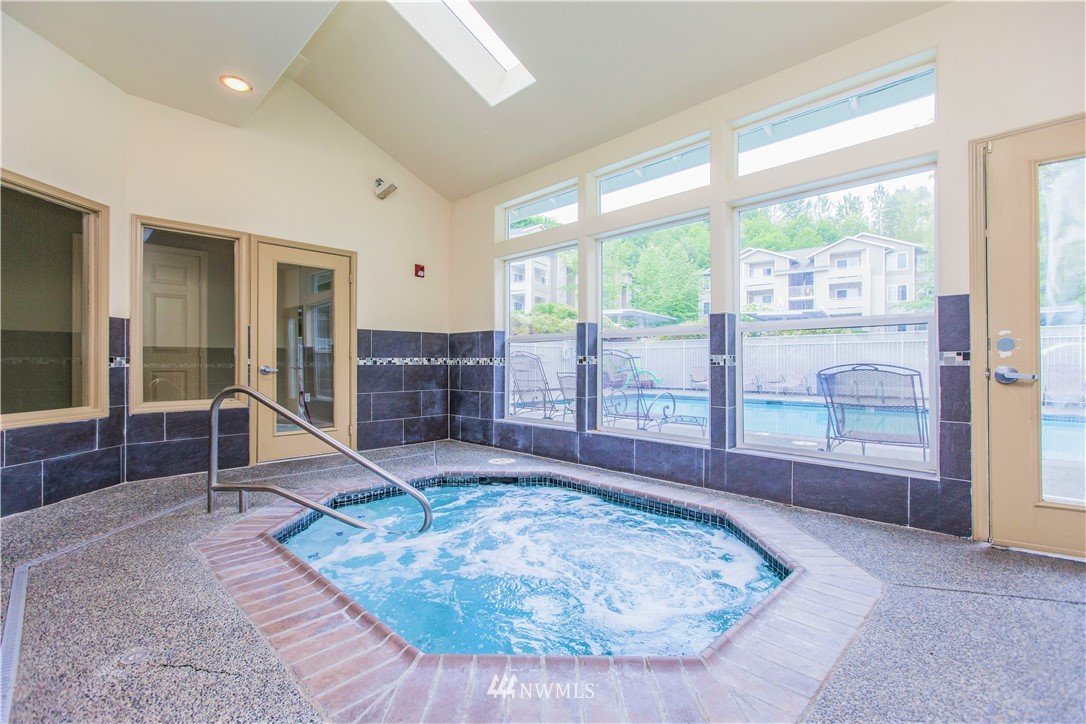 801 Rainier Avenue North, Unit G234 Renton, WA 98057 - Photo 19 of 19 wooden floor with a large window