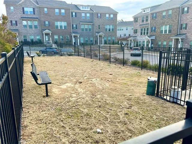 a view of swimming pool from a balcony
