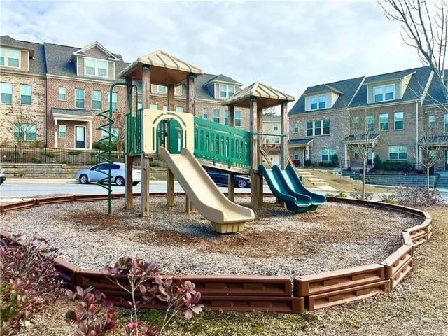 a view of a house with a park