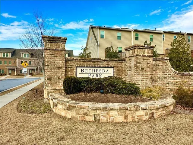 a view of swimming pool with outdoor seating