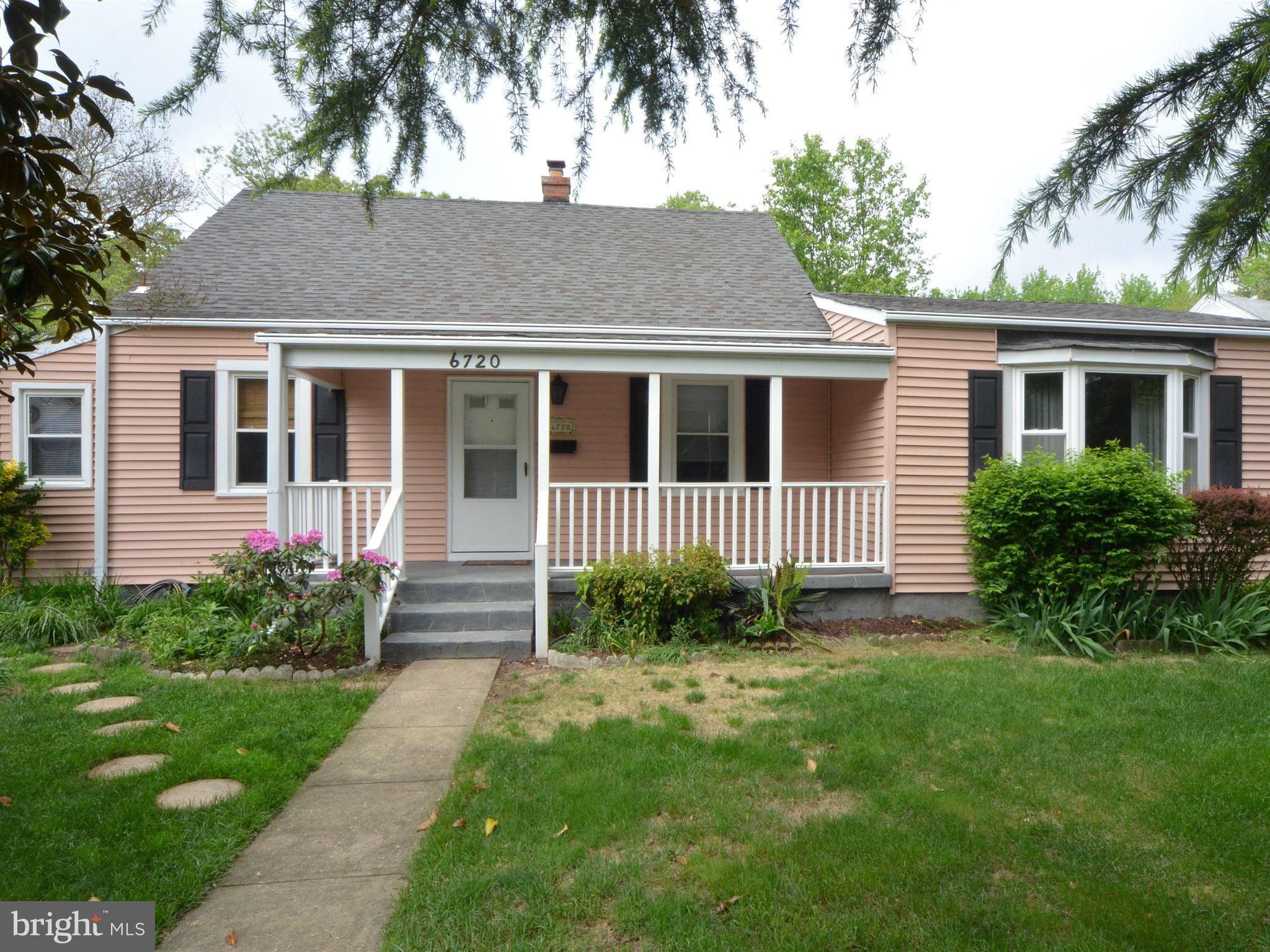 6720 Larkspur Road Morningside, MD 20746 - Photo 1 of 29 a view of front of a house with a yard