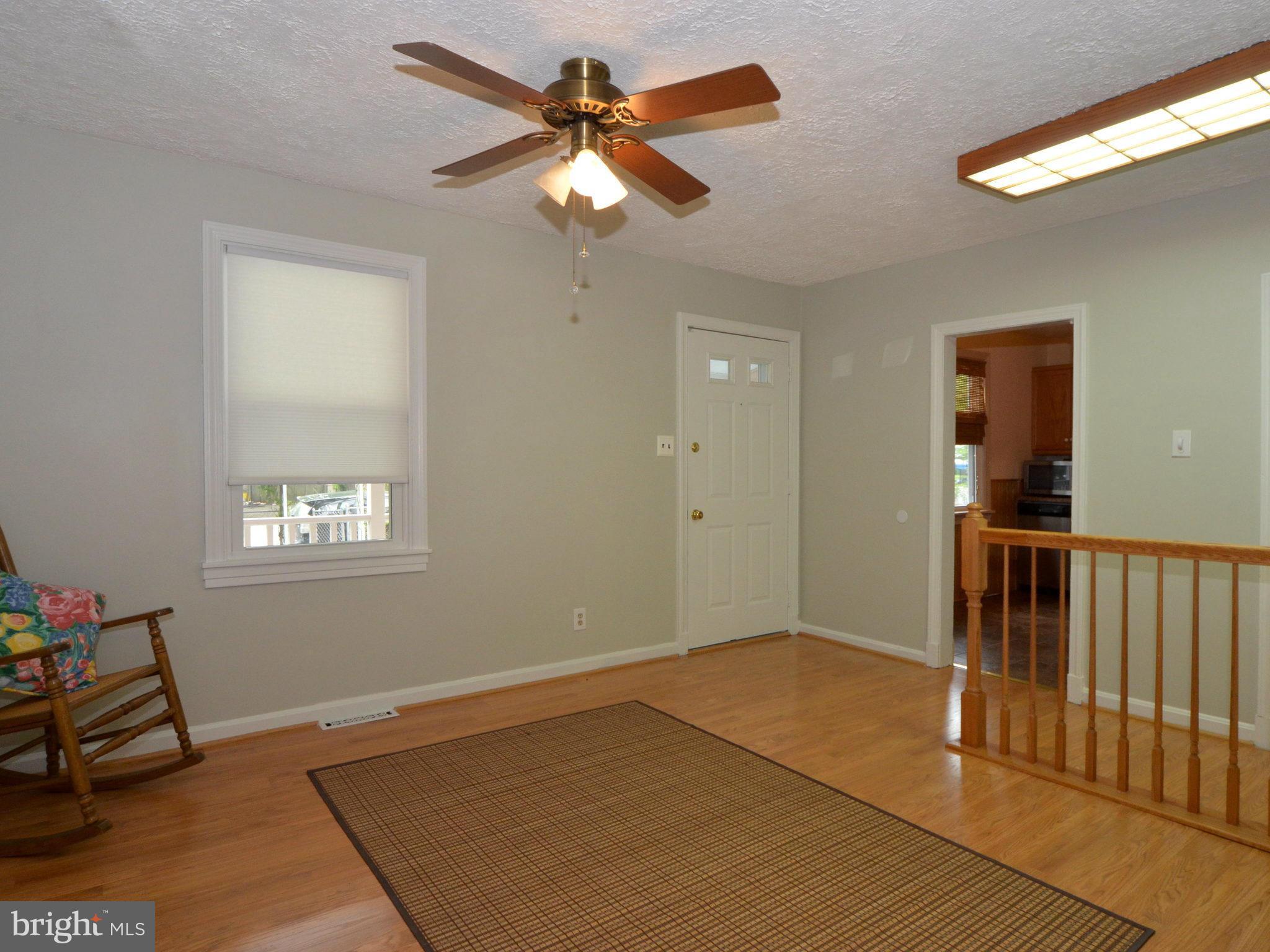 6720 Larkspur Road Morningside, MD 20746 - Photo 3 of 29 a view of an empty room with a window