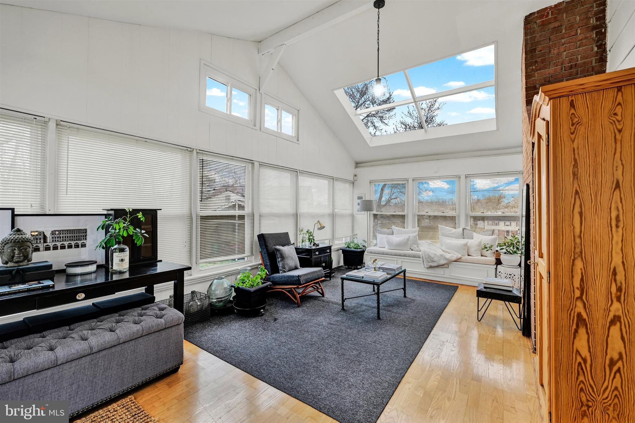 9206 Muskogee Place Adelphi, MD 20783 - Photo 21 of 43 a living room with fireplace furniture and a large window