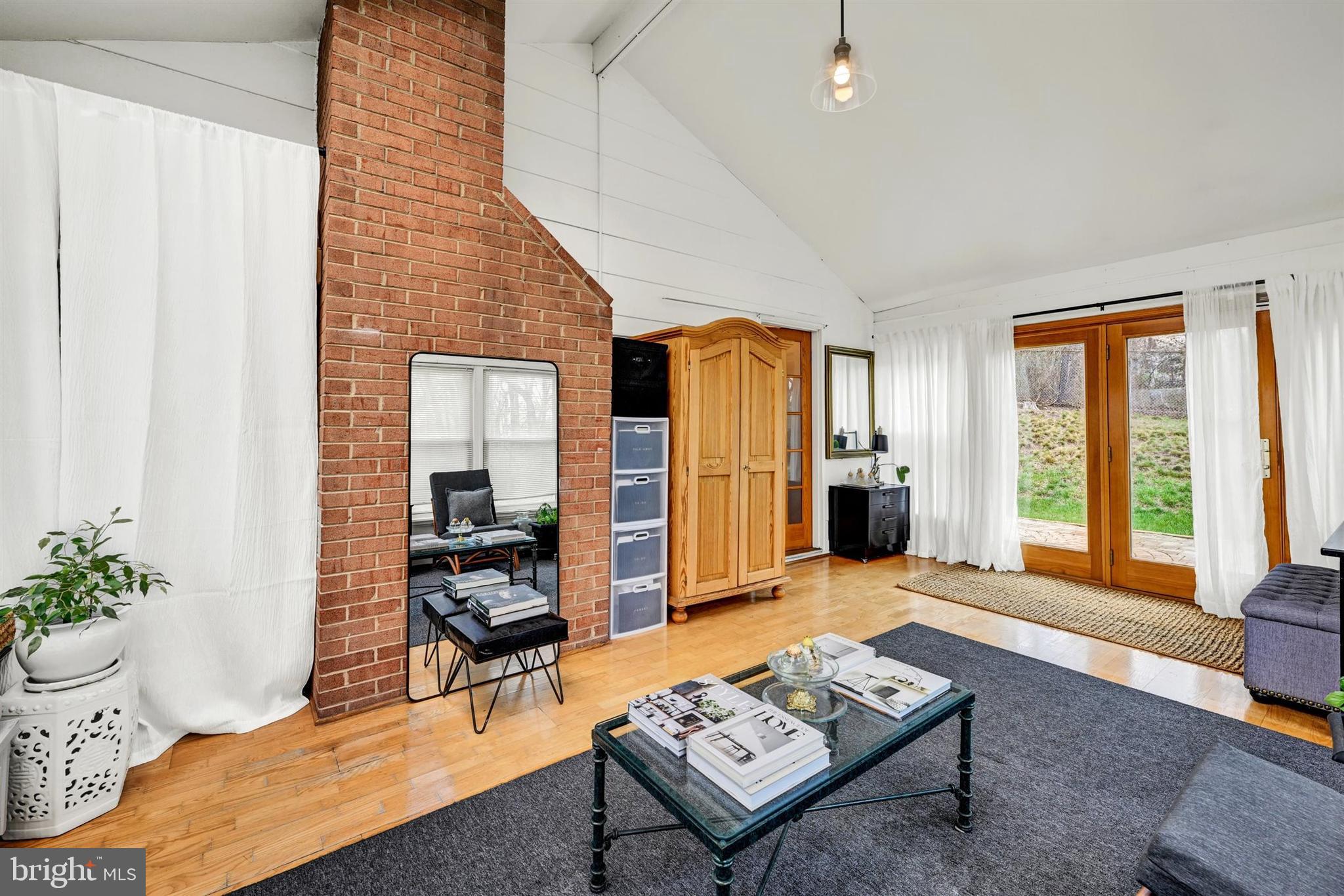 9206 Muskogee Place Adelphi, MD 20783 - Photo 22 of 43 a living room with furniture and large windows