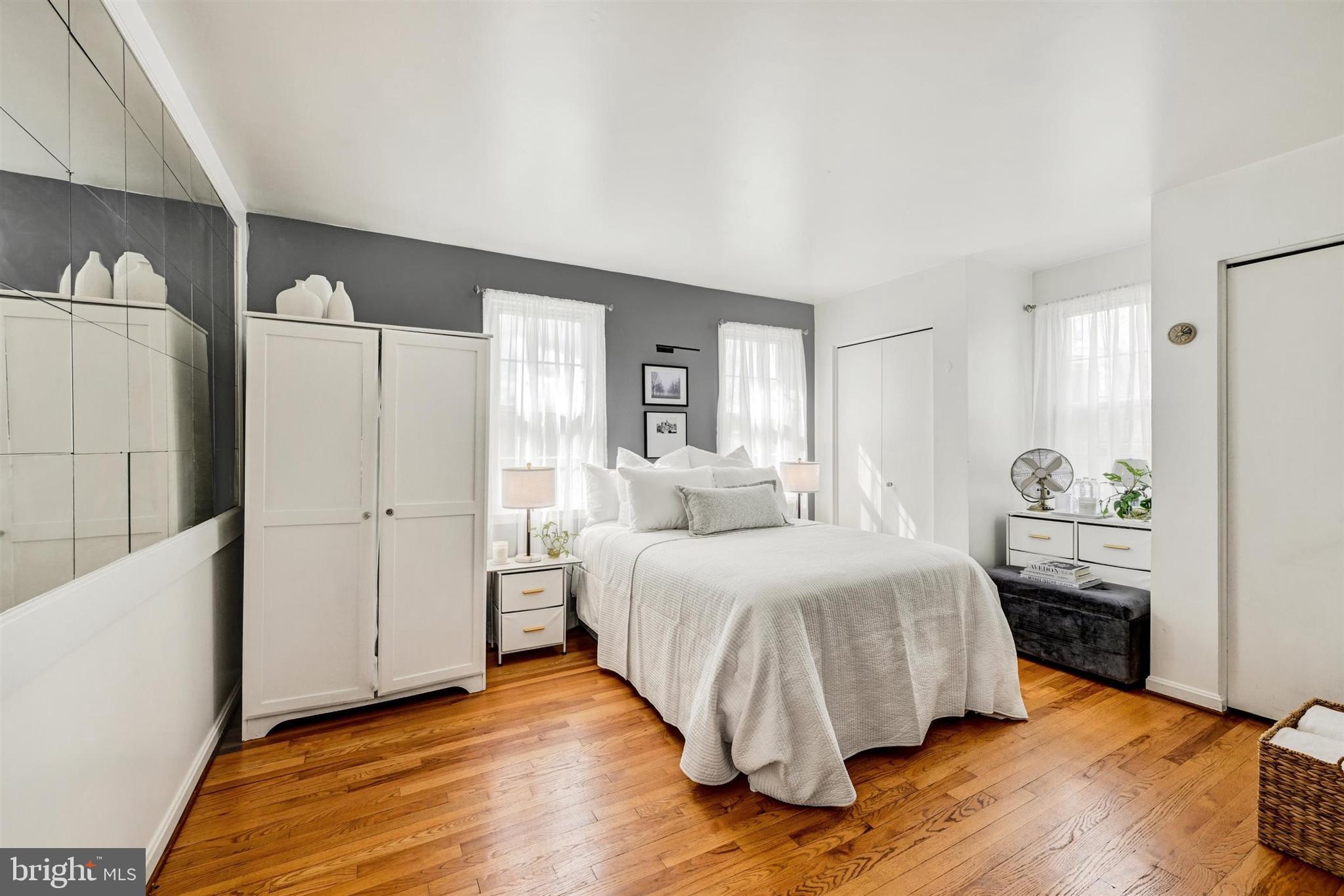 9206 Muskogee Place Adelphi, MD 20783 - Photo 24 of 43 a bedroom with a bed and a refrigerator