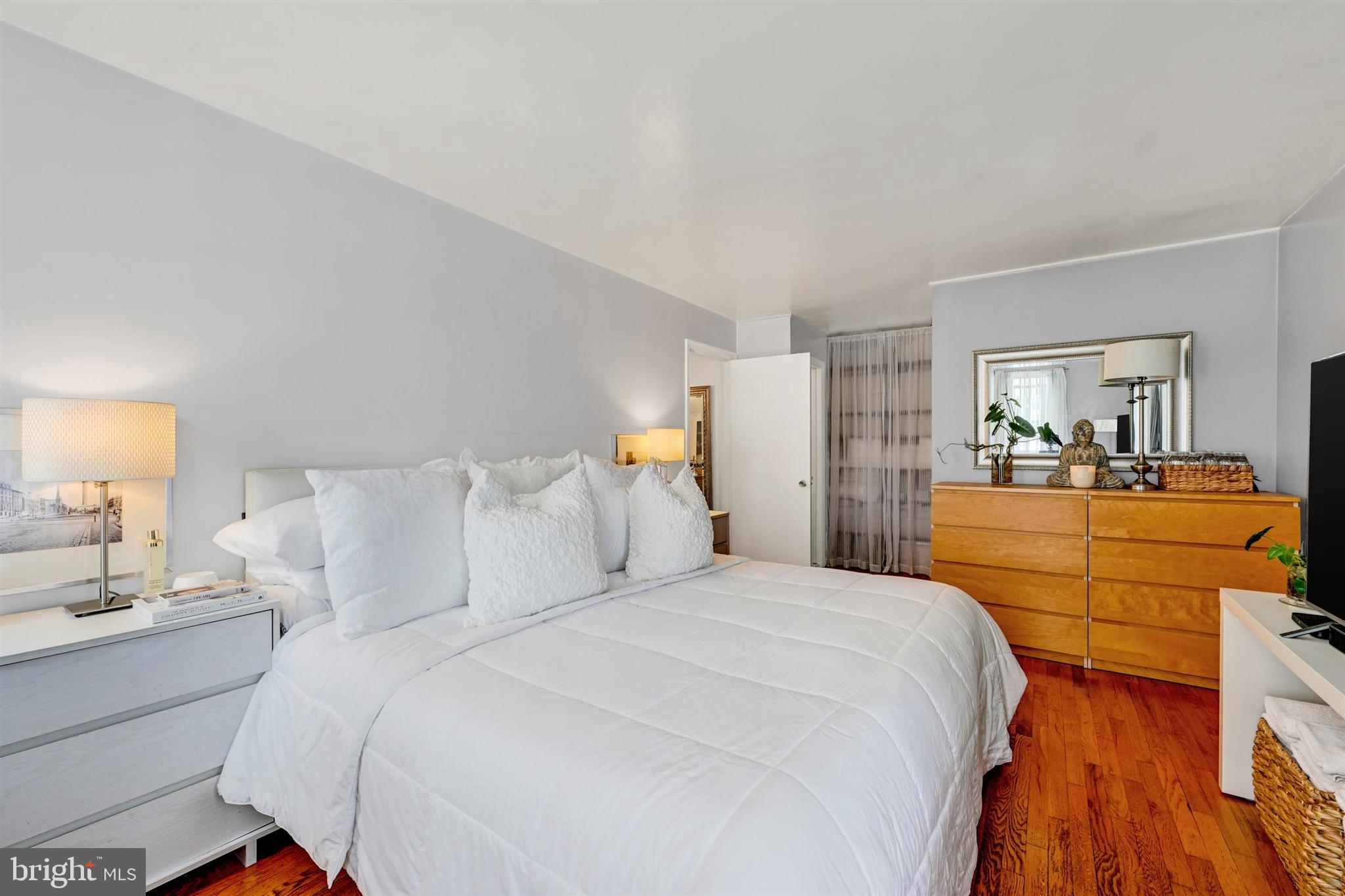 9206 Muskogee Place Adelphi, MD 20783 - Photo 29 of 43 a bedroom with a bed and a dresser