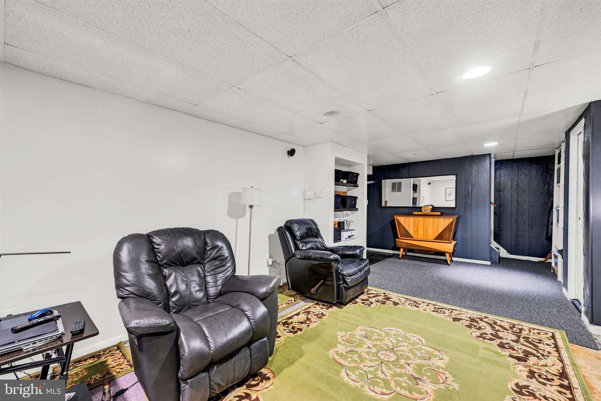 9206 Muskogee Place Adelphi, MD 20783 - Photo 35 of 43 a living room with furniture