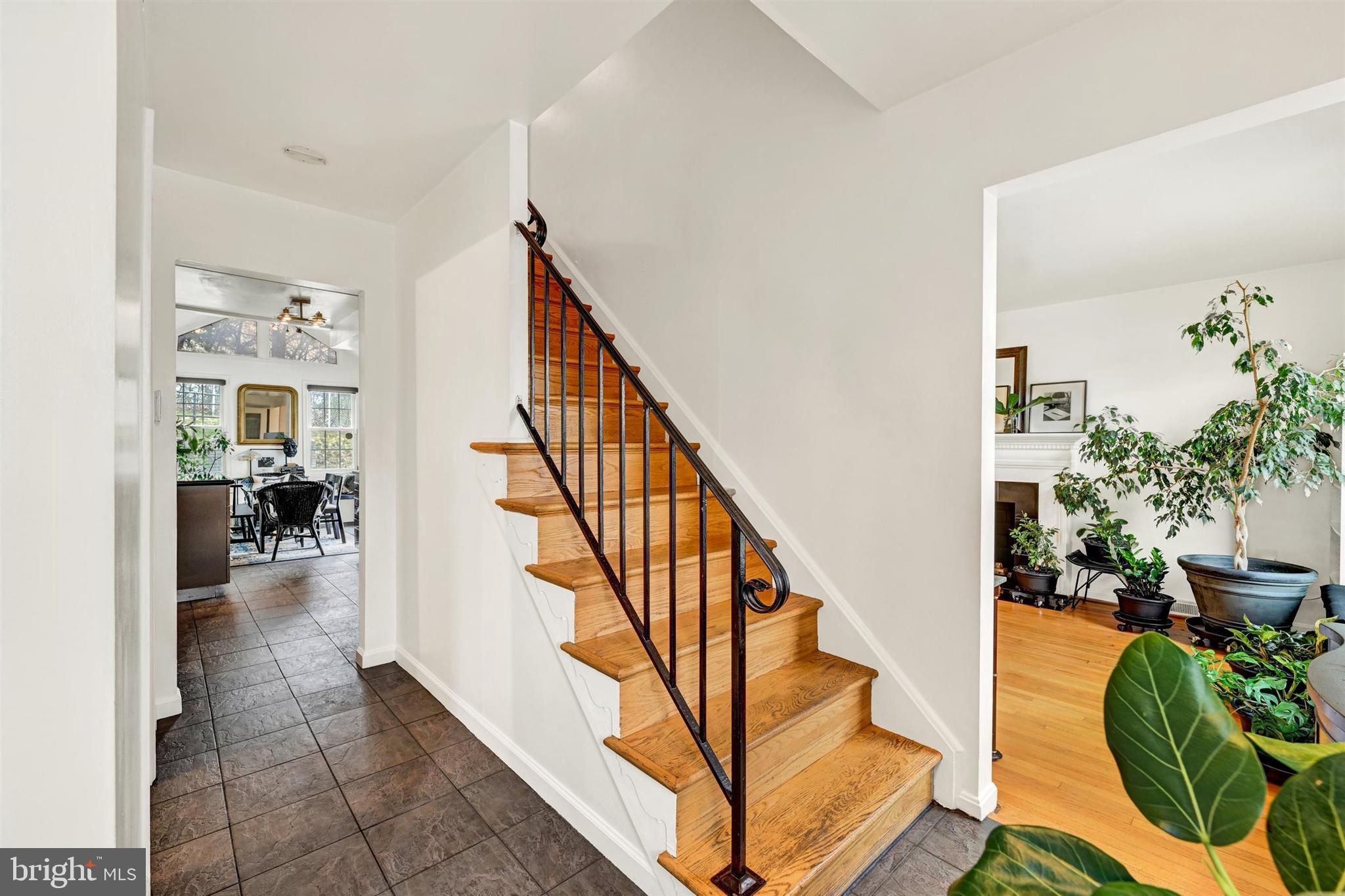 9206 Muskogee Place Adelphi, MD 20783 - Photo 5 of 43 a view of entryway and hall with wooden floor