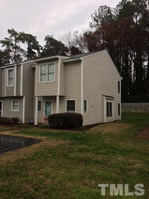 4428 Roller Court Raleigh, NC 27604 - Photo 1 of 10 a front view of a house with a garden