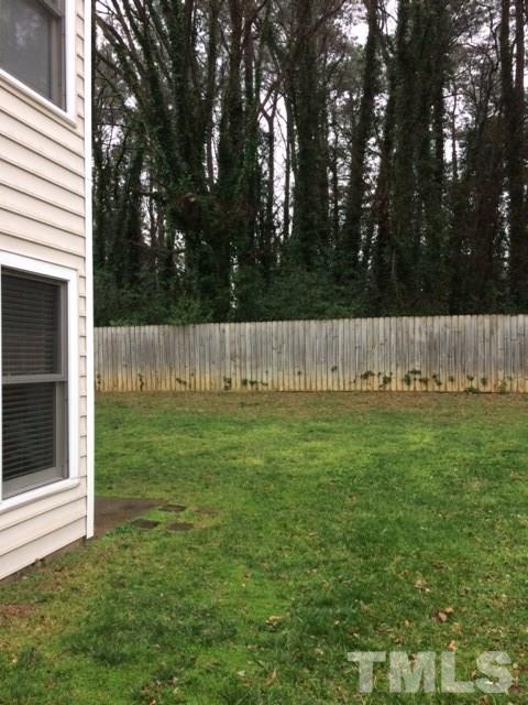 4428 Roller Court Raleigh, NC 27604 - Photo 3 of 10 a view of outdoor space with deck and yard