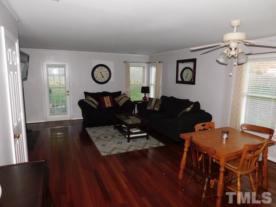 4428 Roller Court Raleigh, NC 27604 - Photo 4 of 10 a living room with furniture and a table