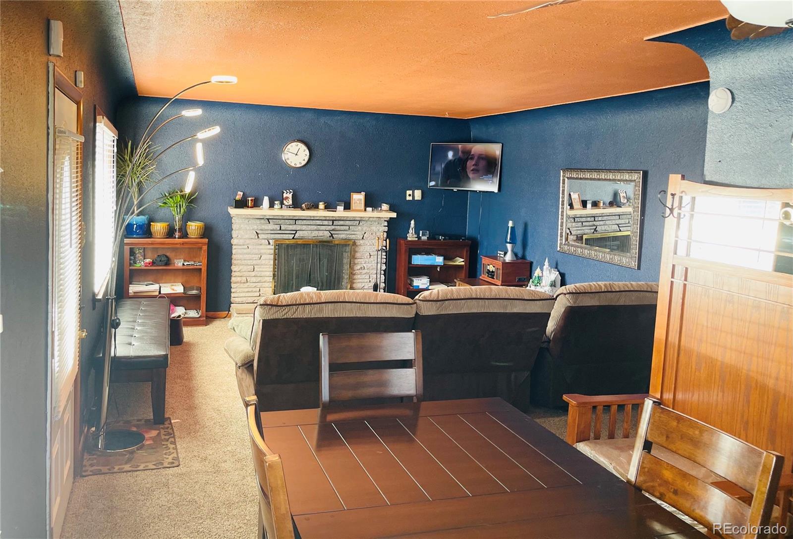 317 9th Street Gilcrest, CO 80623 - Photo 3 of 15 a room with furniture and a table