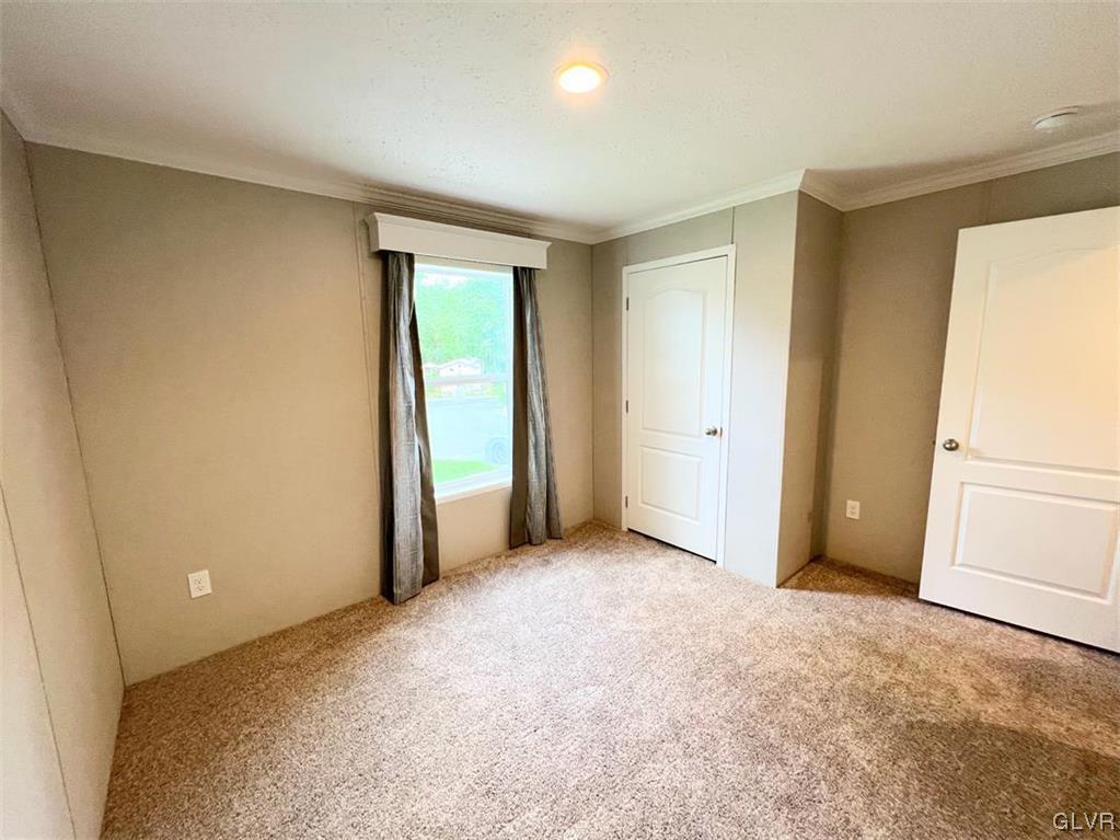 139 Country Club Road, Unit WHS108 Northampton, PA 18067 - Photo 7 of 7 an empty room with closet and windows