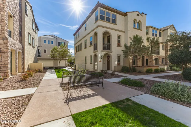 a front view of a building with garden