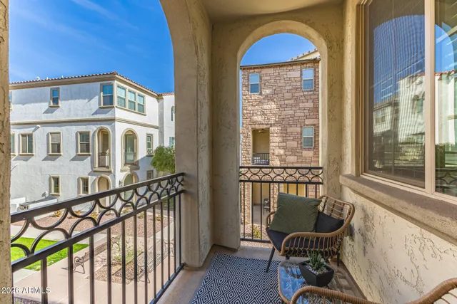 a view of a balcony with a lounge chair