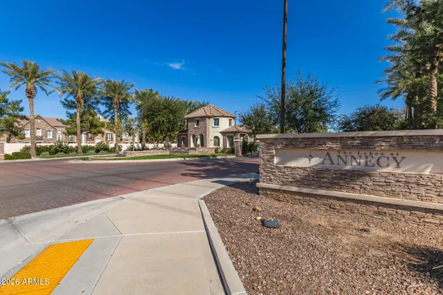 a view of multiple houses with yard