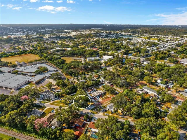 an aerial view of residential building and ocean