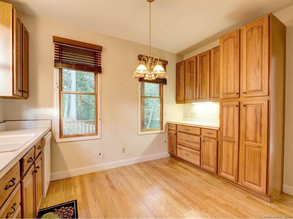 686 Fontana View Road, Unit 56 Bryson City, NC 28713 - Photo 11 of 24 a bedroom with a bed and a dresser