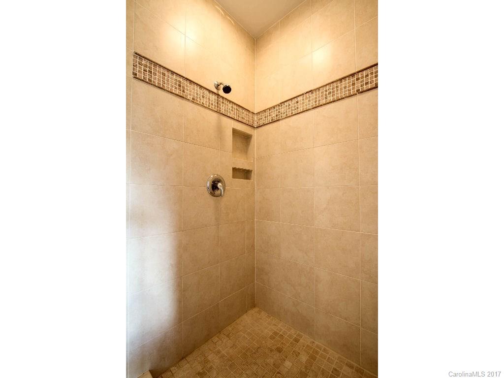 686 Fontana View Road, Unit 56 Bryson City, NC 28713 - Photo 15 of 24 a bathroom with a shower and a sink