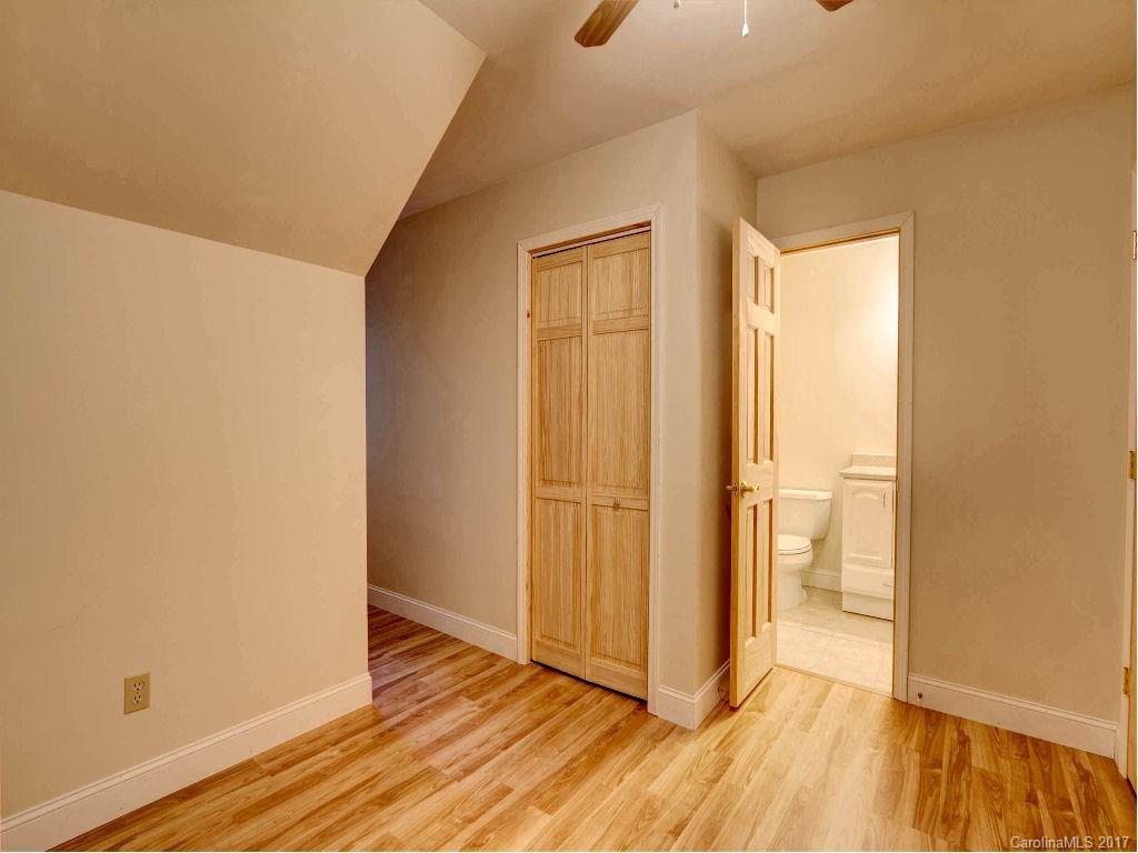 686 Fontana View Road, Unit 56 Bryson City, NC 28713 - Photo 17 of 24 a view of a room with wooden floor and a window