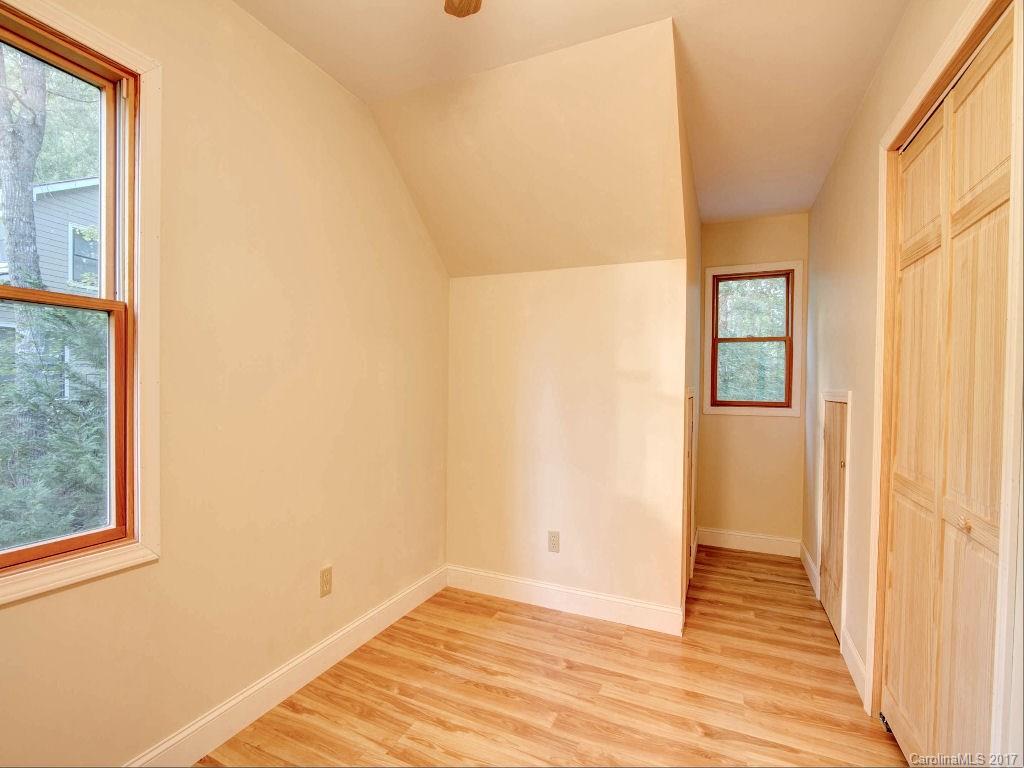 686 Fontana View Road, Unit 56 Bryson City, NC 28713 - Photo 18 of 24 a view of a room that has wooden floor and windows