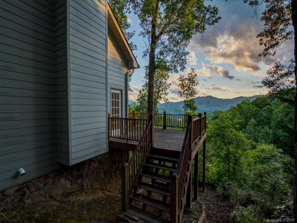 686 Fontana View Road, Unit 56 Bryson City, NC 28713 - Photo 22 of 24 a view of balcony with wooden floor and fence