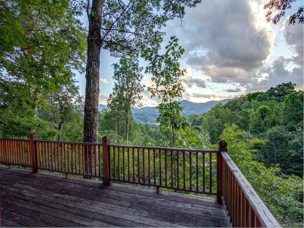686 Fontana View Road, Unit 56 Bryson City, NC 28713 - Photo 23 of 24 a balcony with wooden floor and fence