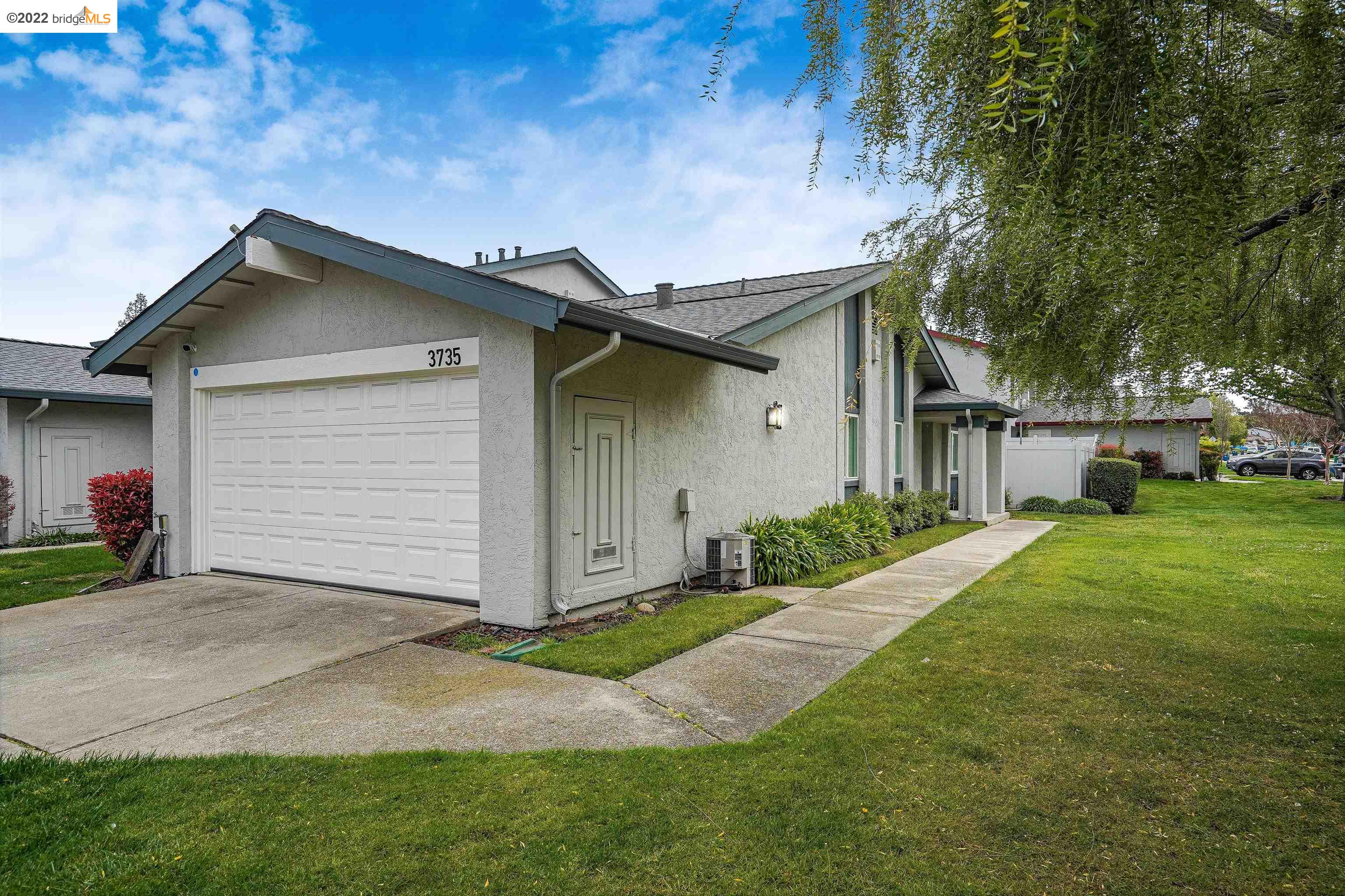 3735 Norris Canyon Road San Ramon, CA 94583 - Photo 1 of 1 a front view of a house with a yard and garage