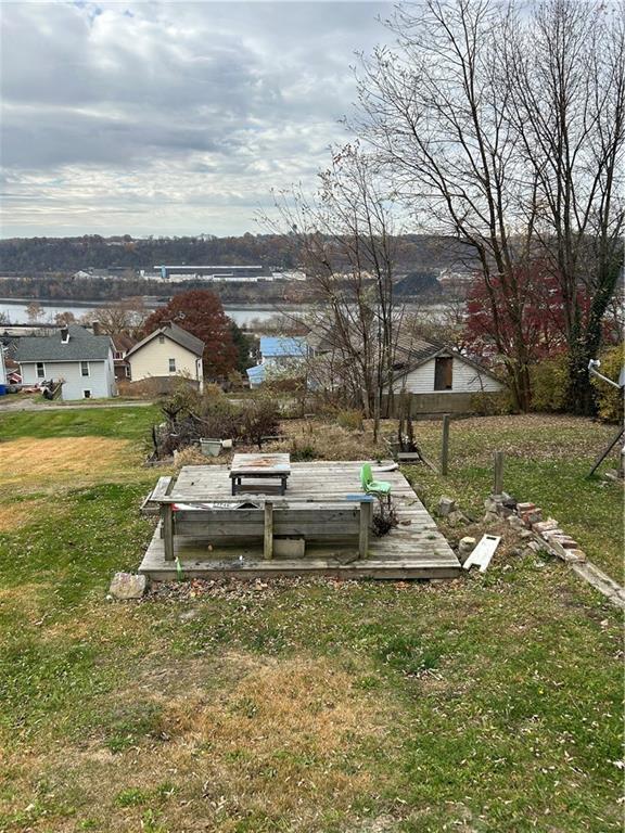 1106 8th Avenue Freedom, PA 15042 - Photo 2 of 3 a view of a lake with a white house