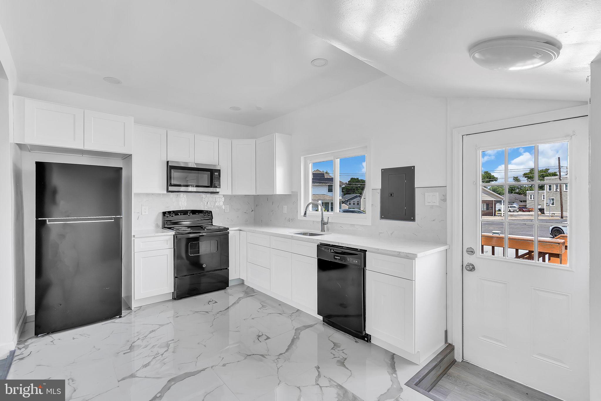264 Birch Street Carneys Point, NJ 08069 - Photo 12 of 29 Modern kitchen with sleek finishes.