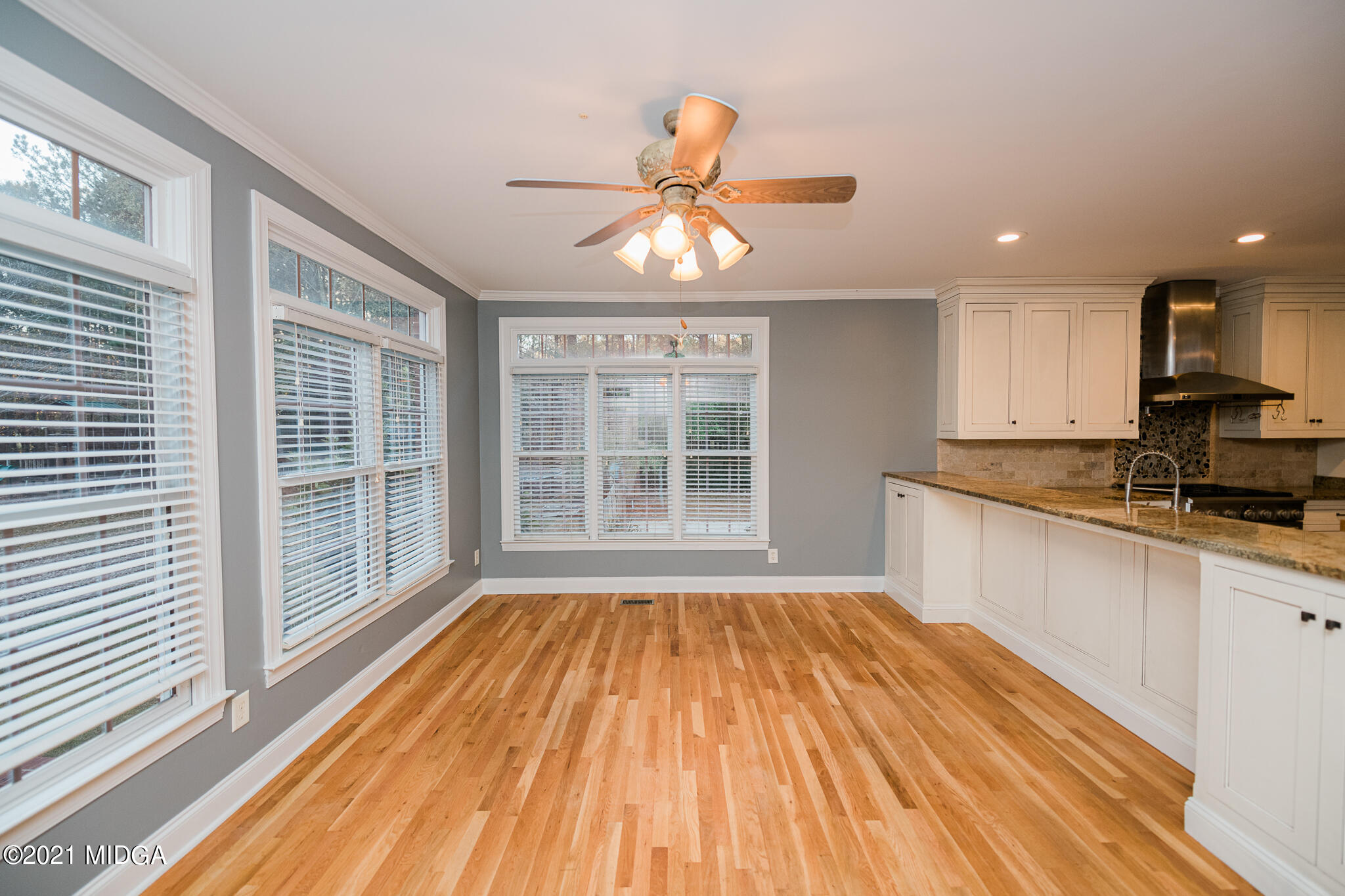 116 Hampton Ridge Road Macon, GA 31220 - Photo 20 of 77 a view of a kitchen with wooden floor and a window